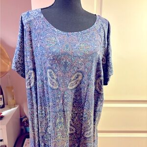 NWT multi-colored patterned loose fit top with v split at back of waist.